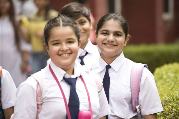 depositphotos_288093390-stock-photo-group-of-schoolboys-and-schoolgirls
